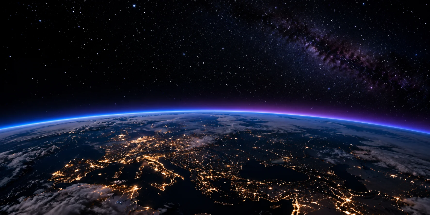 Earth's illuminated cities and atmospheric horizon viewed from space